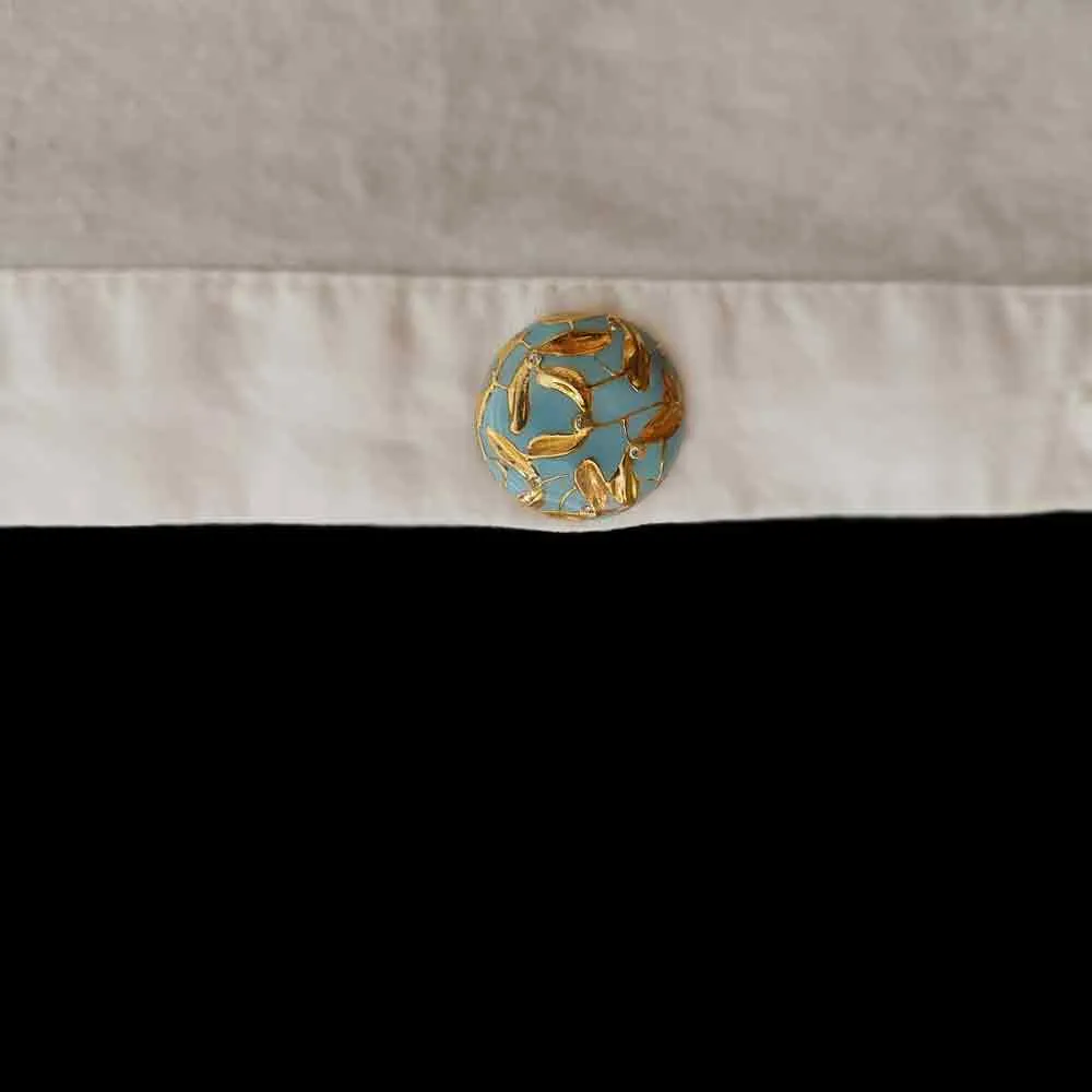 Pastel Blue Button With Gold Work
